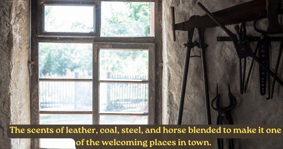 Image from What Fire Cannot Take Patreon. It says " The scents of leather, coal, steel, and horse blended to make it one of the welcoming places in town. "