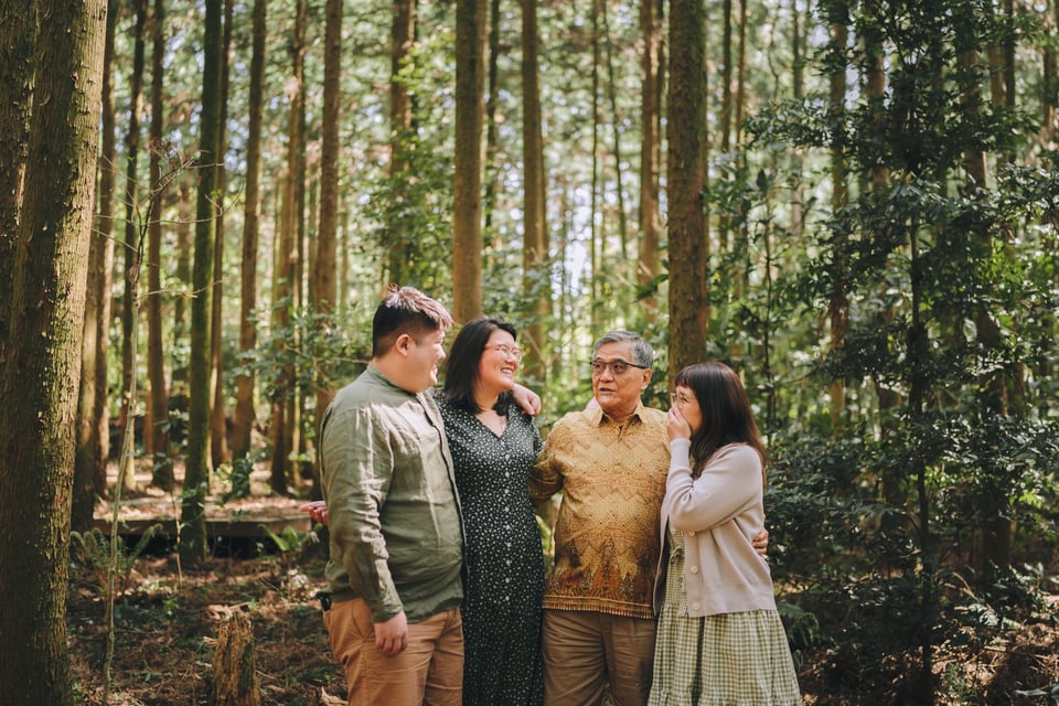 Family of four in a forest