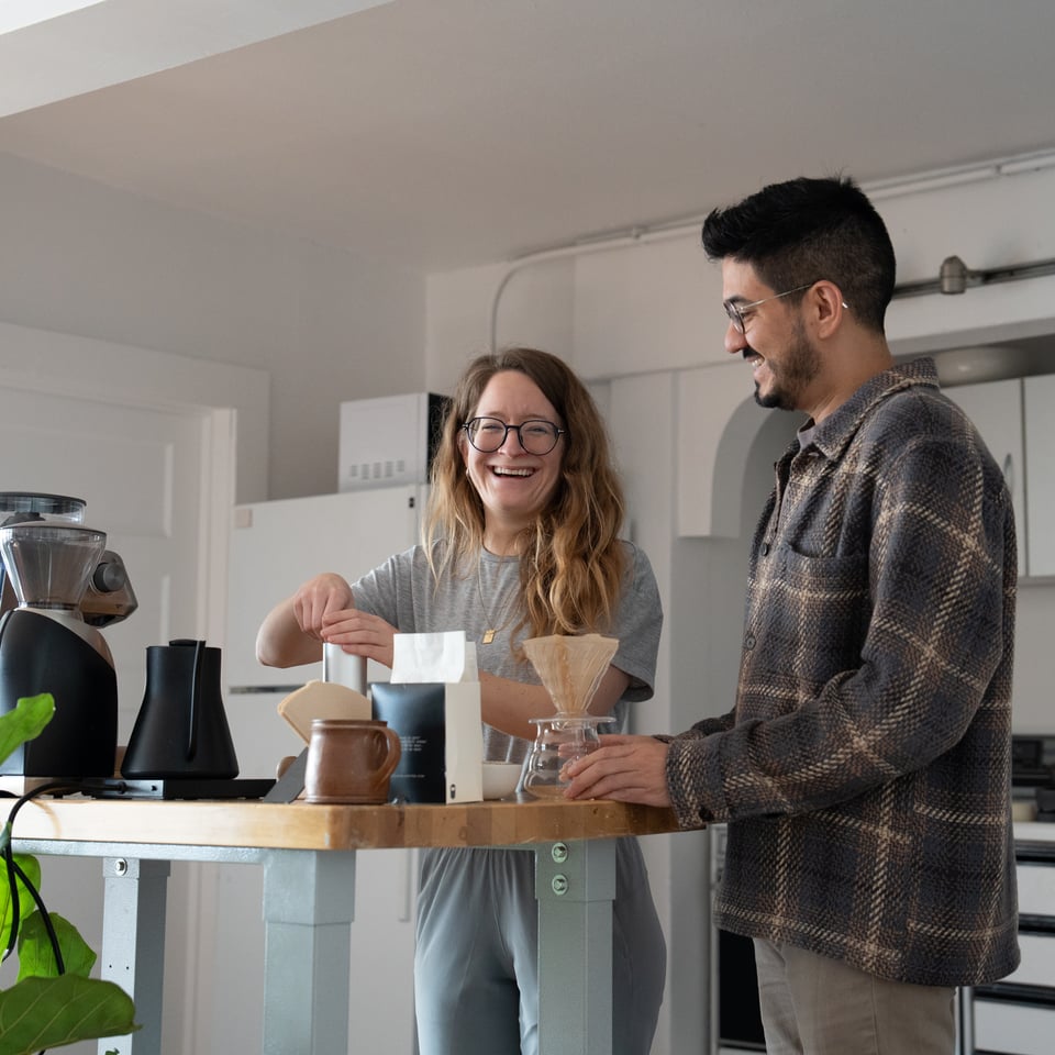 Emily learning some coffee tips.