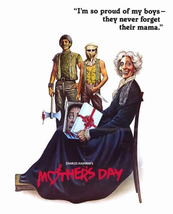 The classic film poster for the exceptionally nasty Troma-distributed film Mother's Day: two demented looking young people in the back (one in a helmet and military vest with a bloody double bladed axe, the other with a sack over his head, holding a large knife), while Mother sits on a wooden chair closer to us, wearing a long black dress and a white lace scarf, smiling, half her face a skull, holding a gift box that contains a man's severed head. The tagline: "I'm so proud of my boys - they never forget their mama."