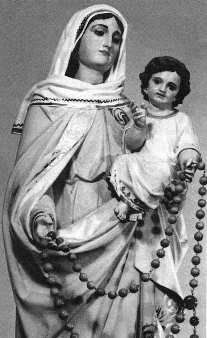 Mary holding Jesus as a child, both of them holding a large string of Rosary beads.