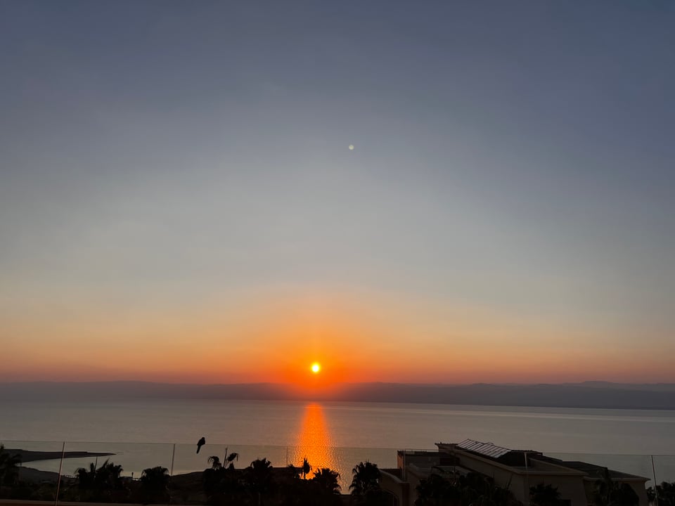 Orange sunset over water