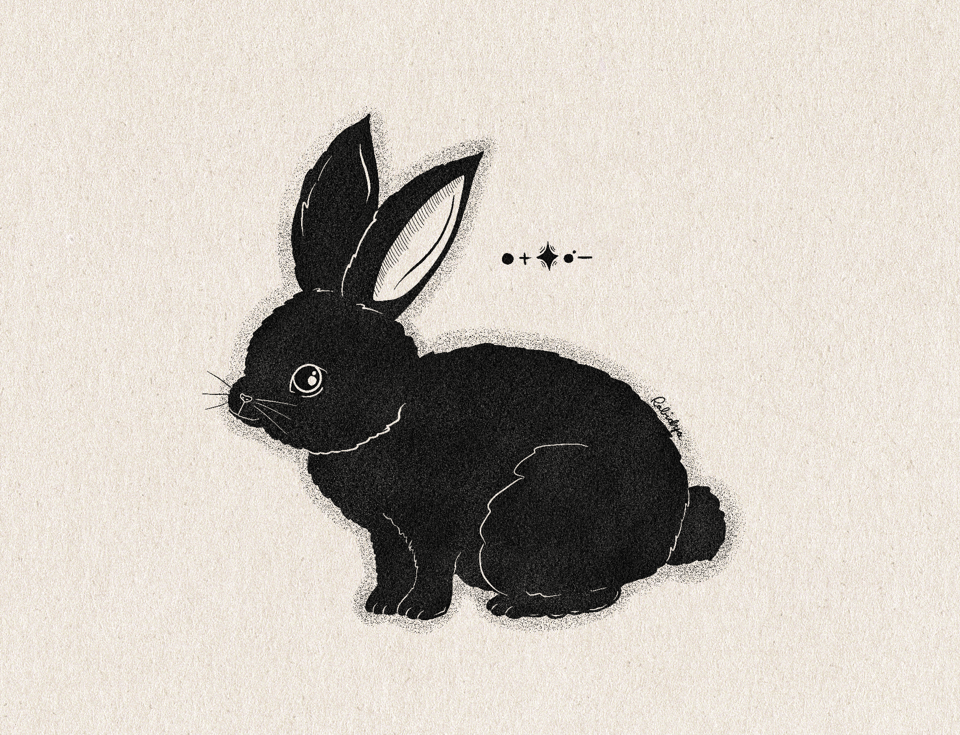 drawing of a black rabbit with some stars/symbols above it to the right