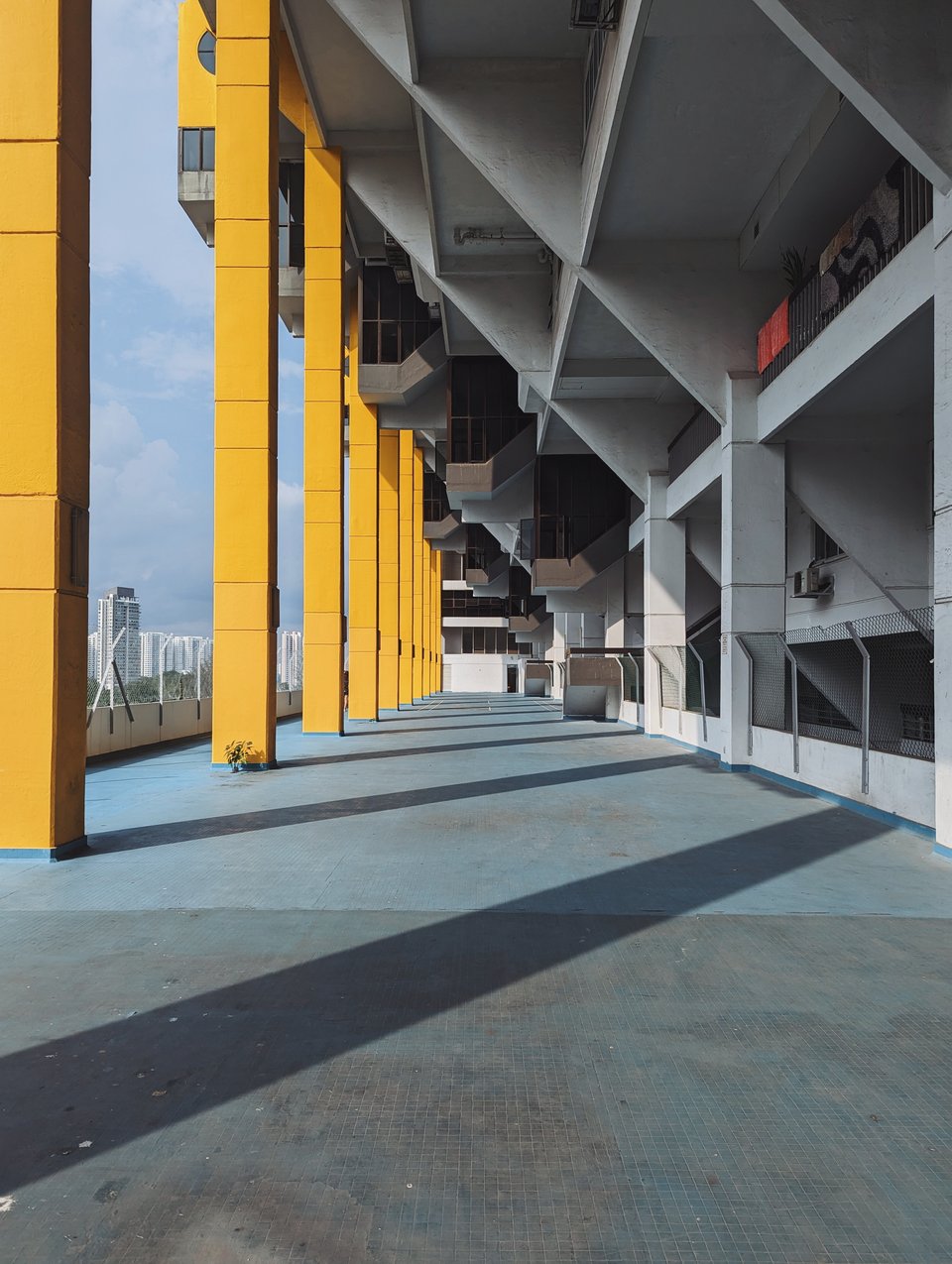 Shadows cast over the pillars of the now-demolished Golden Mile Complex