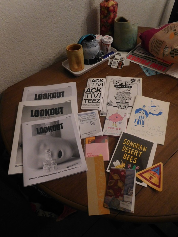 A pile of zines