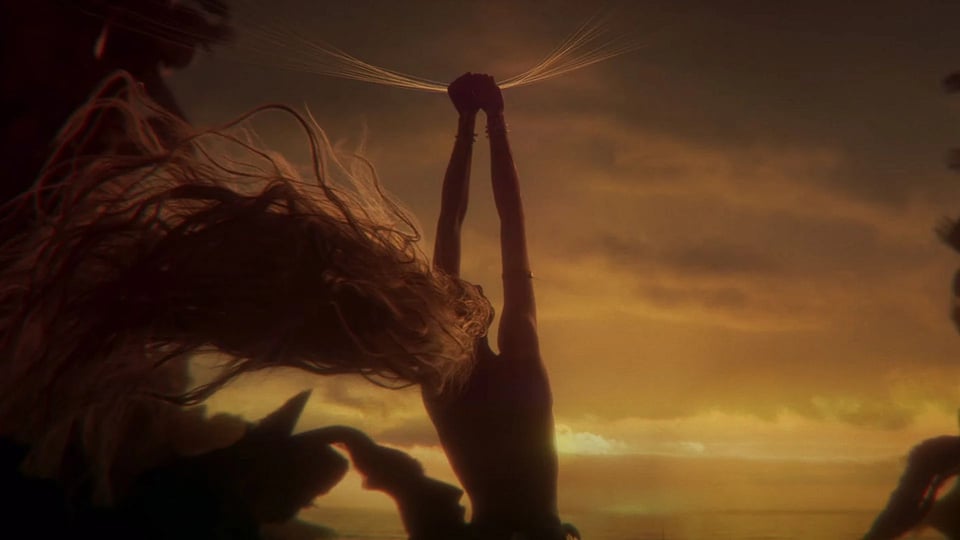 Elden Ring goddess Marika creating the Elden Ring with strands of gold, as seen in Shadow of the Erdtree's cinematic story trailer.