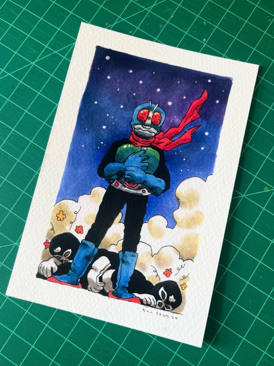 a picture of a print of kamen rider standing over some shocker agents he's just beaten up