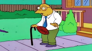 hans moleman from the simpsons getting a football to the groin