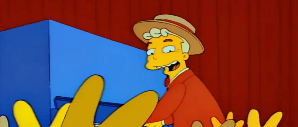 The monorail salesman from The Simpsons plays the piano for a sea of waving yellow hands