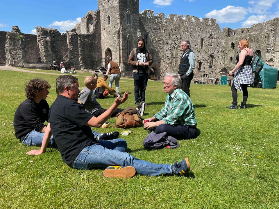 Various grognards lounged in the grounds of Chepstow Castle as they await the next round of tabletop gaming.