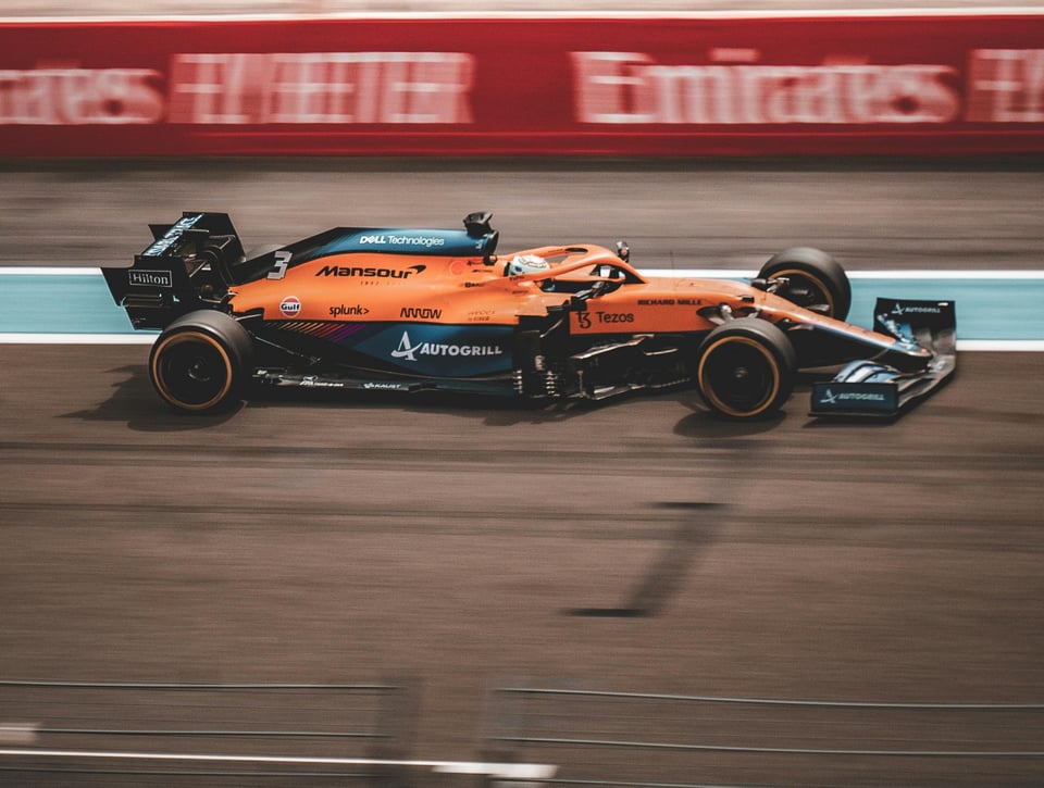 Daniel's McLaren is heading very fast towards the right, the car is in focus but the background is blurred. Taken at the French GP, I think.