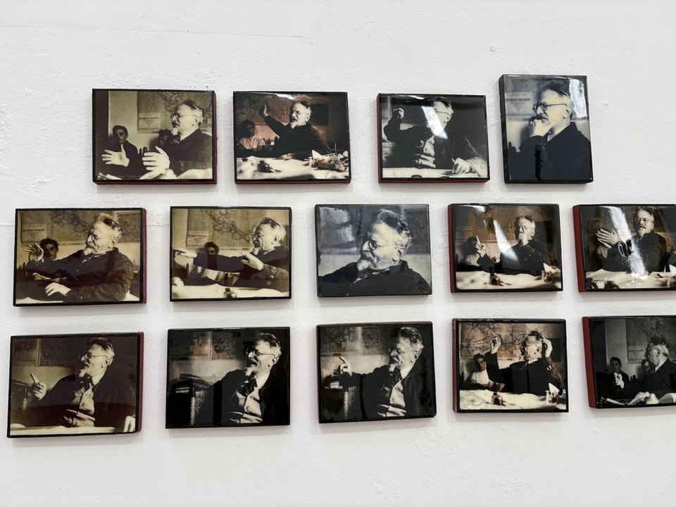 A photo montage of Leon Trotsky on display at the Trotsky Museum, in which he is clearly in animated conversation but which looks startlingly like he's on a video podcast (sans microphone & headset, obviously)