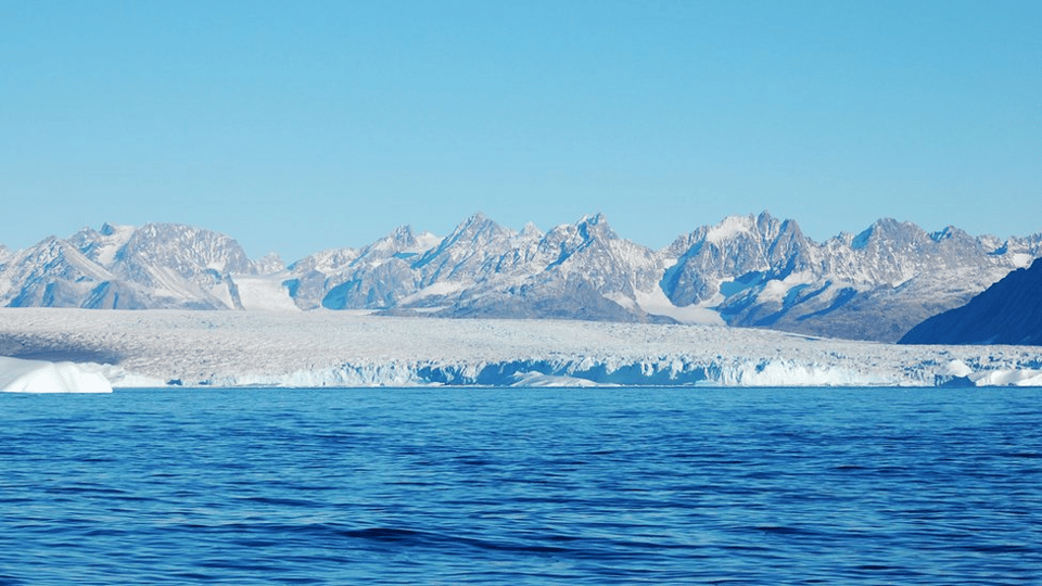 A frozen, barren landscape in Greenland.