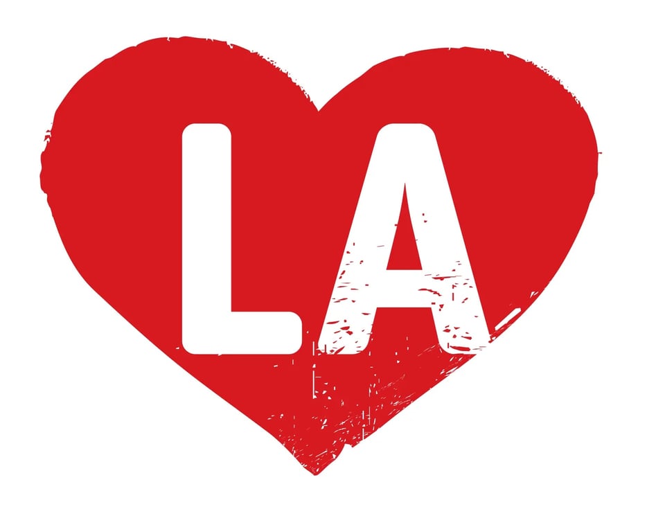 Red heart, white text reading "LA"