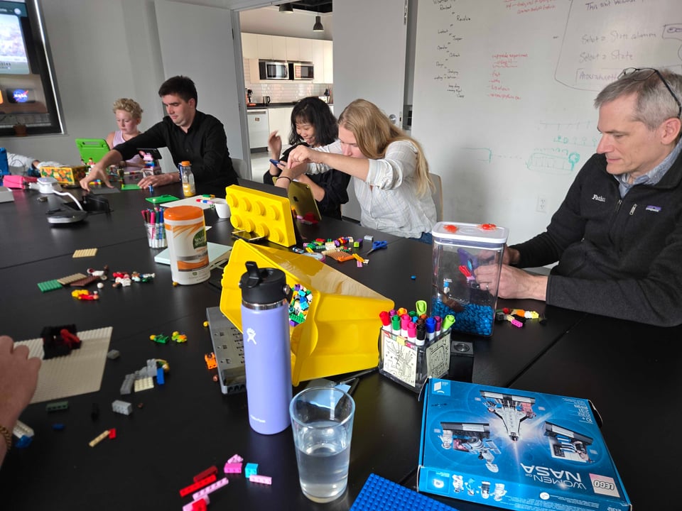People working on their Lego stop motion films