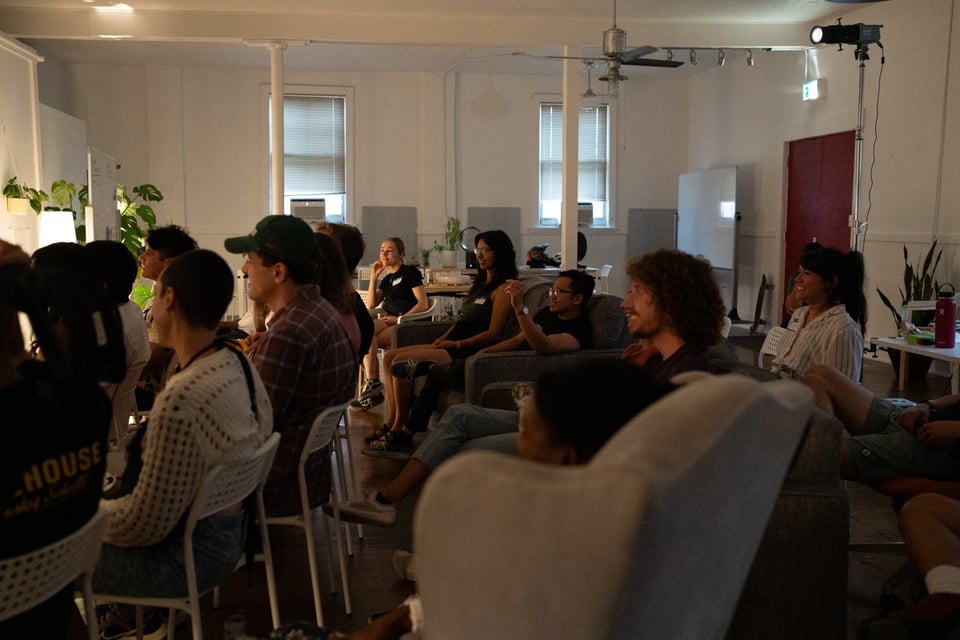 A crowd watches a story.
