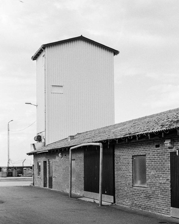A building belonging to the fishing industry and the port in a small port town.