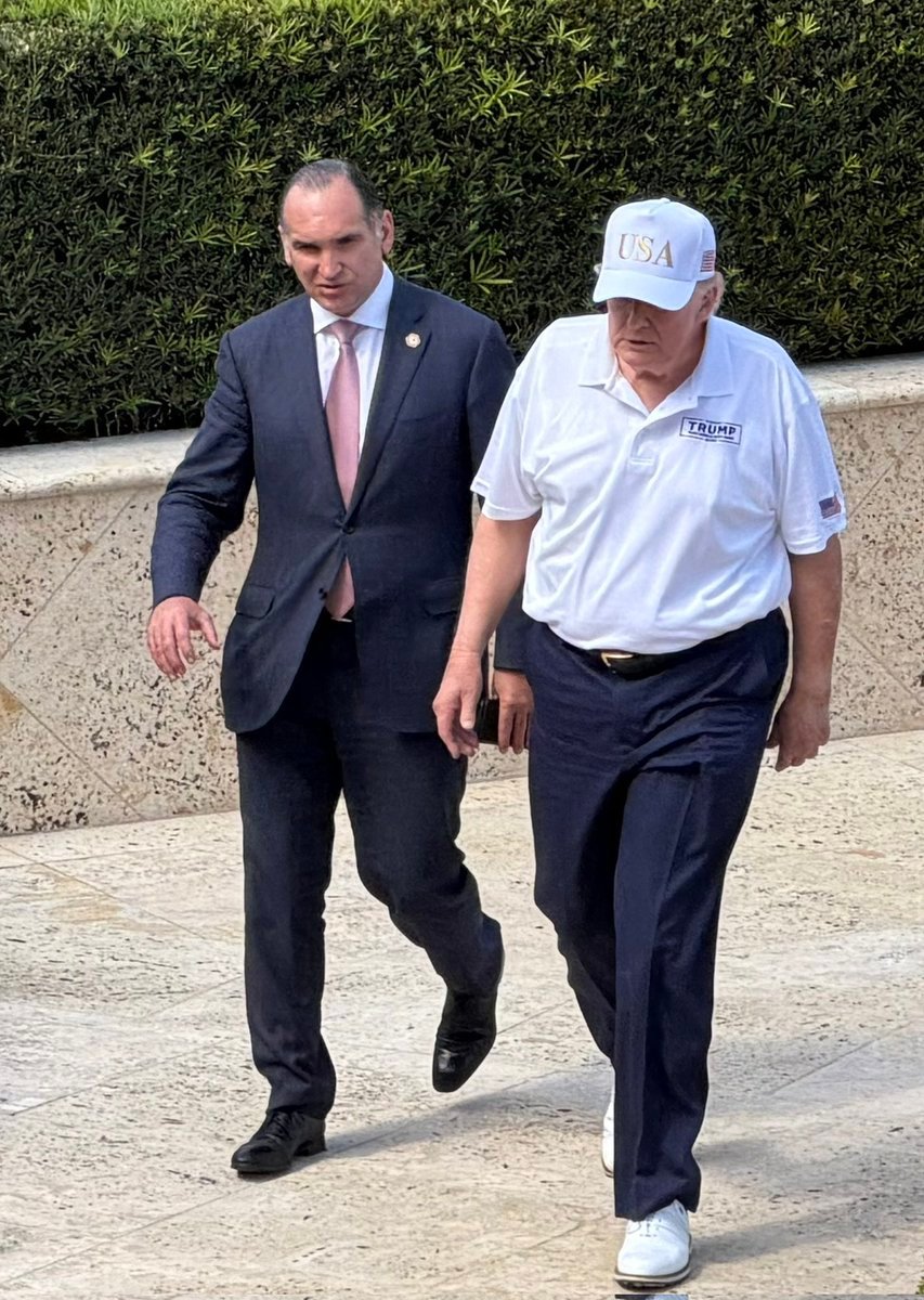 Trump went golfing in his same hat- the merch.