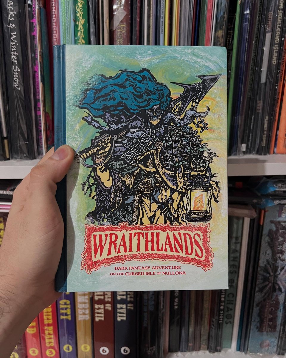 Cover of the hardcover book Wraithlands, showing a stylized figure of a warrior in blue and green tones.