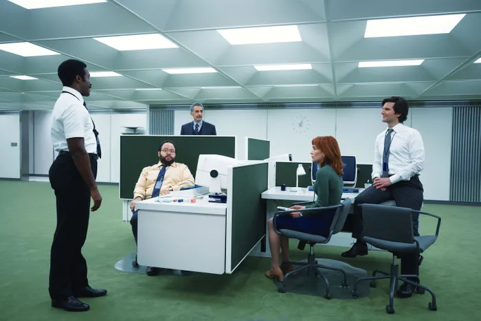 The main cast of Severance around the macrodata refinement stations