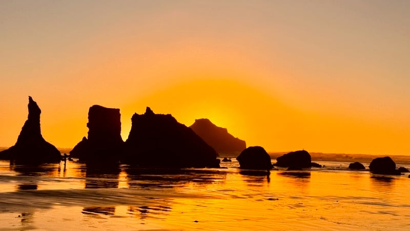 Sunset view of the beach and rocks near Bandon, OR