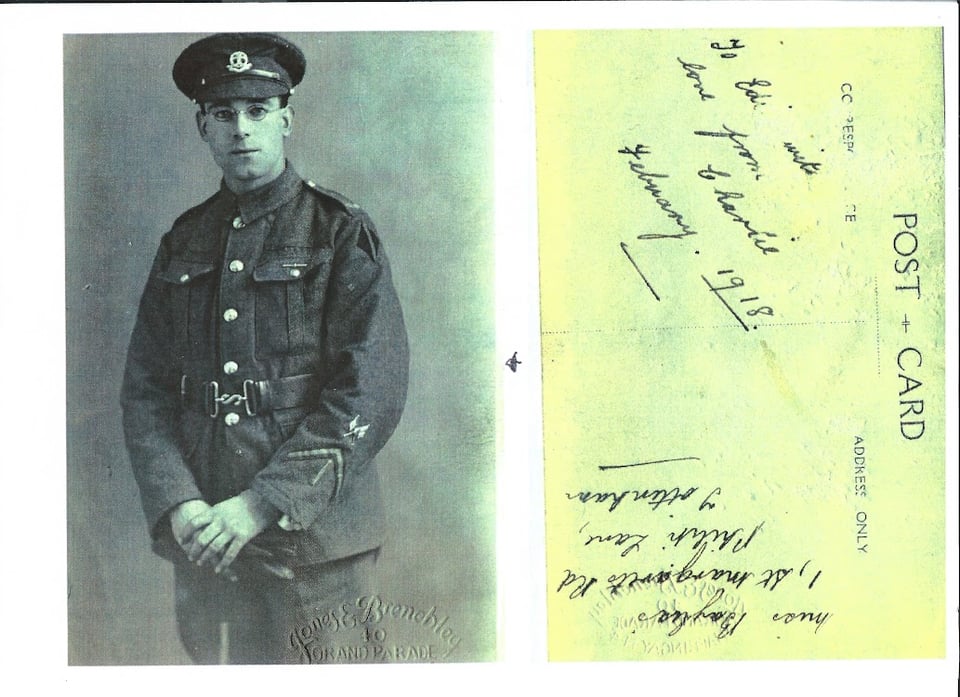 A Postcard of a photo of Private Charlie Bayliss, dressed in the uniform of a first world war British soldier.