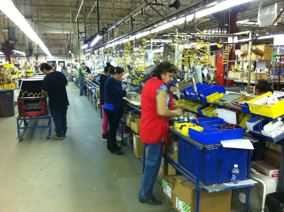 Factory workers at the Stern pinball manufacturing plant outside Chicago in 2014.