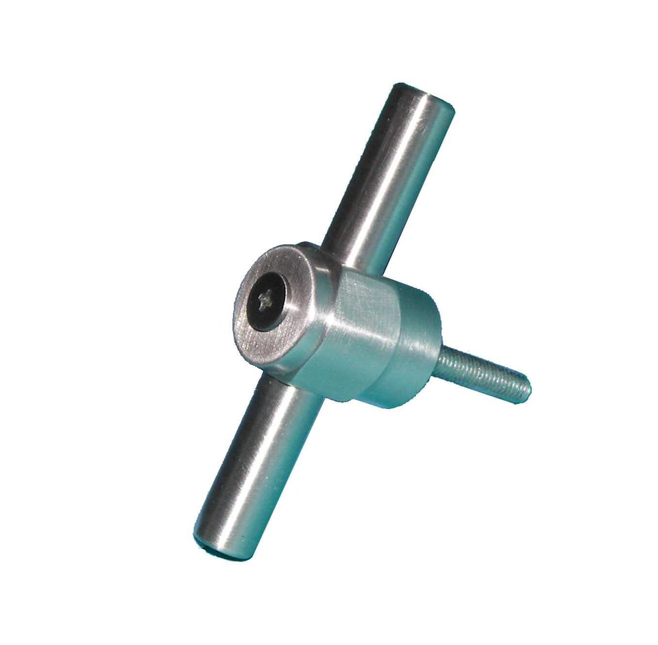 Drum head tensioner