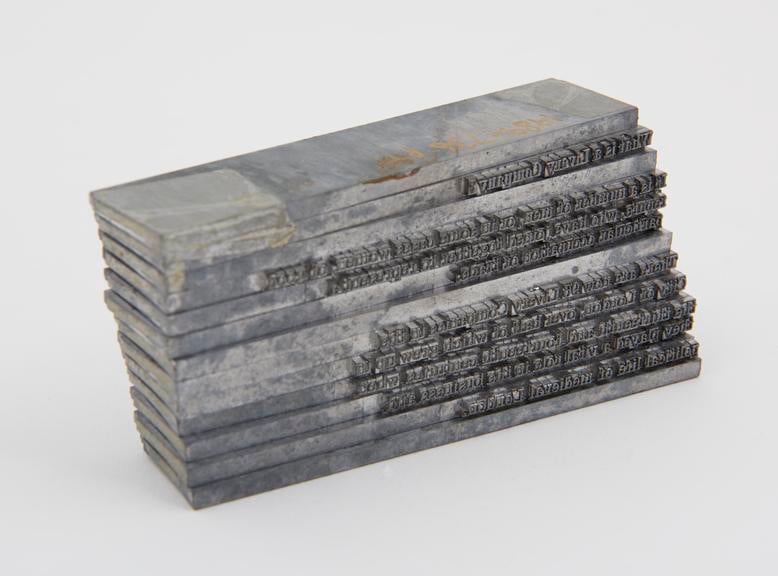 A stack of linotype slugs, from https://collection.sciencemuseumgroup.org.uk/objects/co38444/nine-linotype-slugs-text-beginning-what-is-a-livery-company