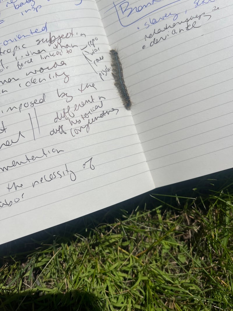 an open notebook with writing on it