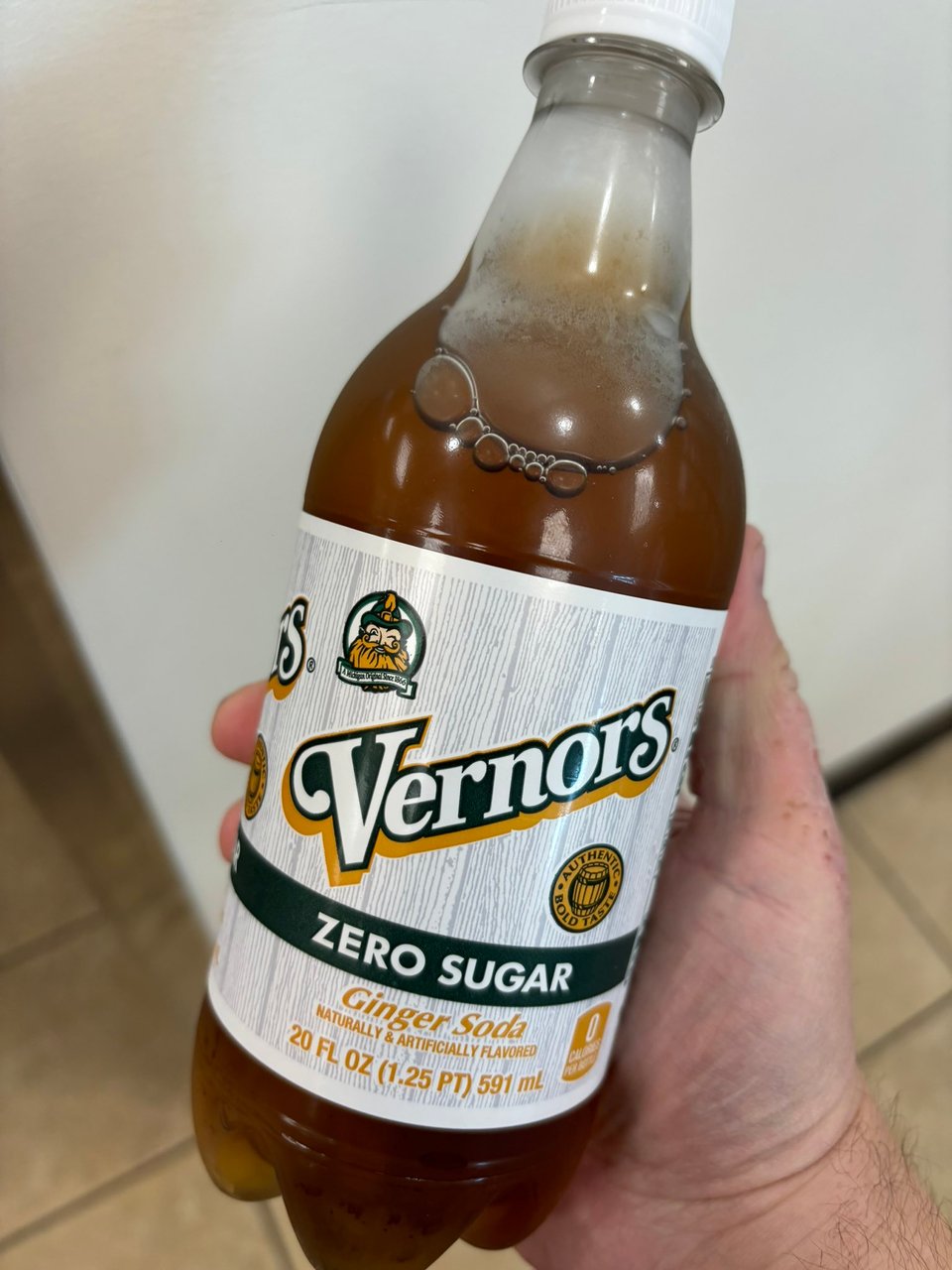 Neil holding a bottle of Vernors Zero Sugar ginger ale