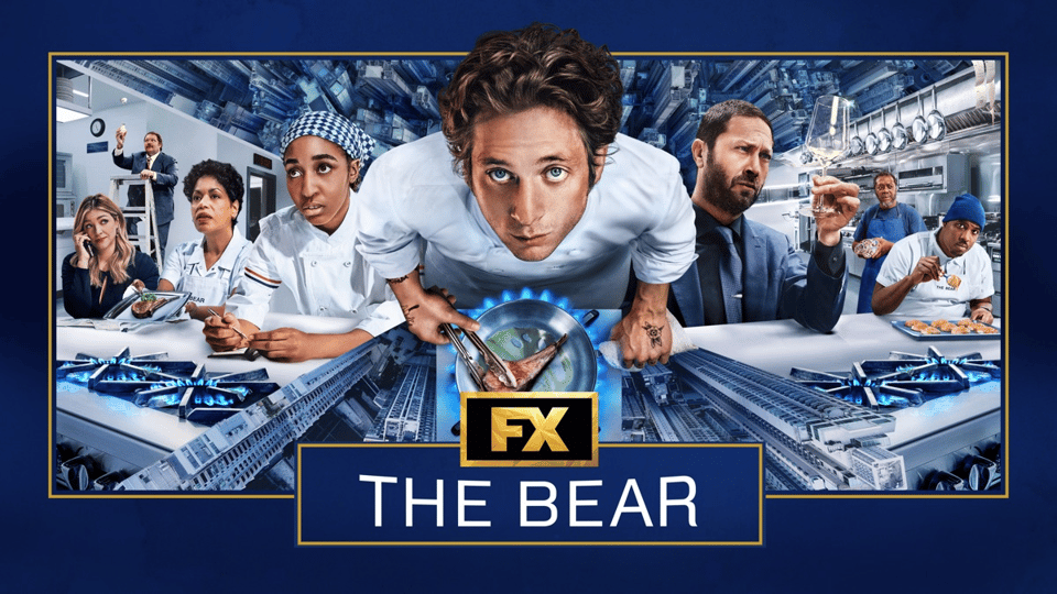A group of diverse characters in a busy kitchen setting, featuring a central figure leaning over a plate, with the title "The Bear" prominently displayed.