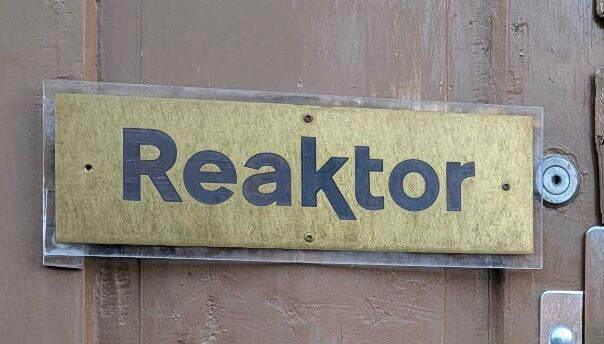 Door sign with Reaktor logo