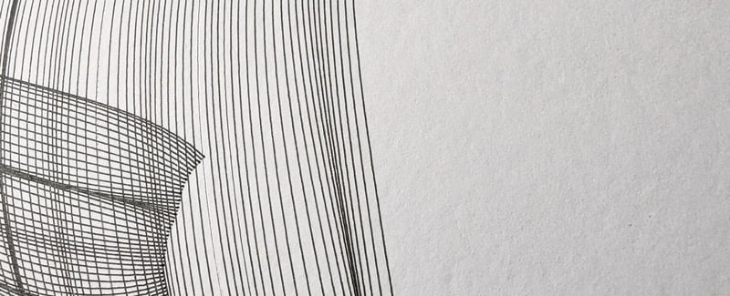 A close up of black lines on white paper. One line is faint, almost missing.
