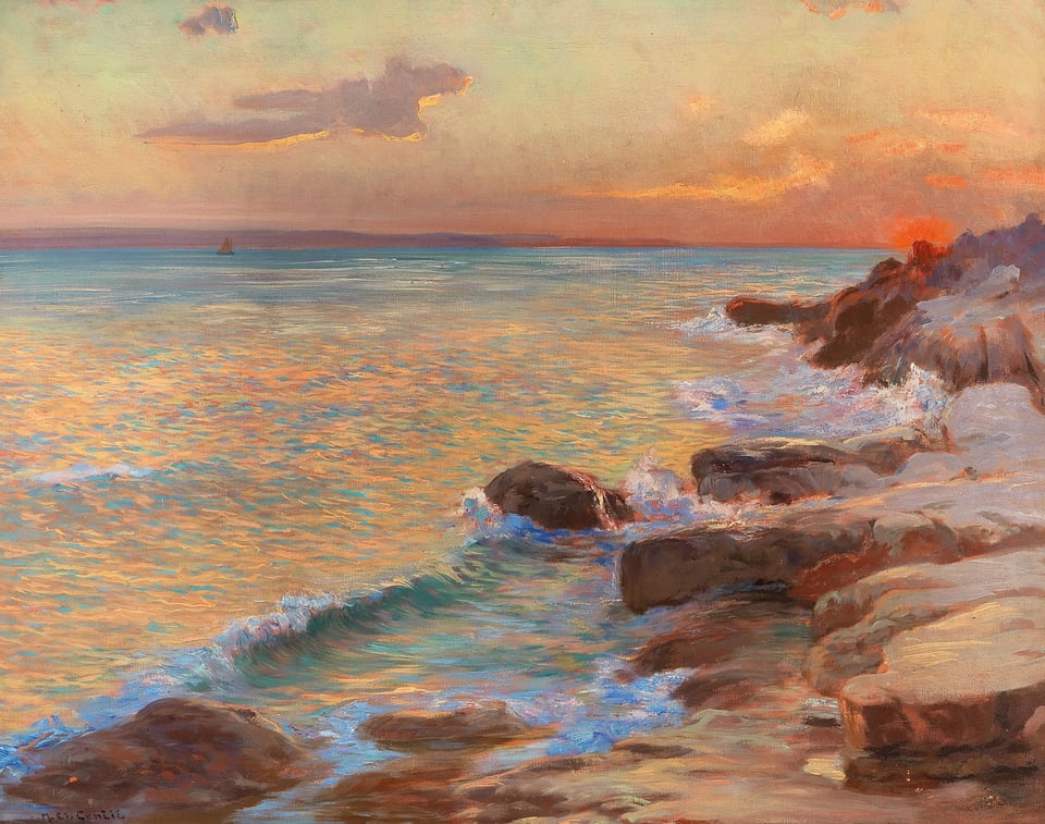 a sunset over the ocean