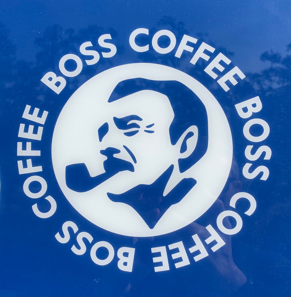 photo of Coffee Boss logo from a vending machine in Japan