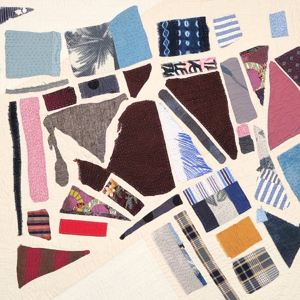 A detail view of Meet Me at the Corner, a patchwork quilt by Sarah Atlee.