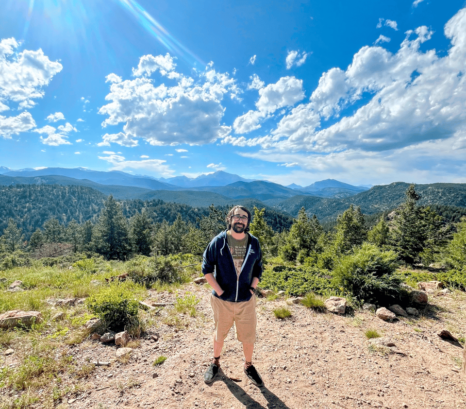 Ferran on a peak on Colorado mountains
