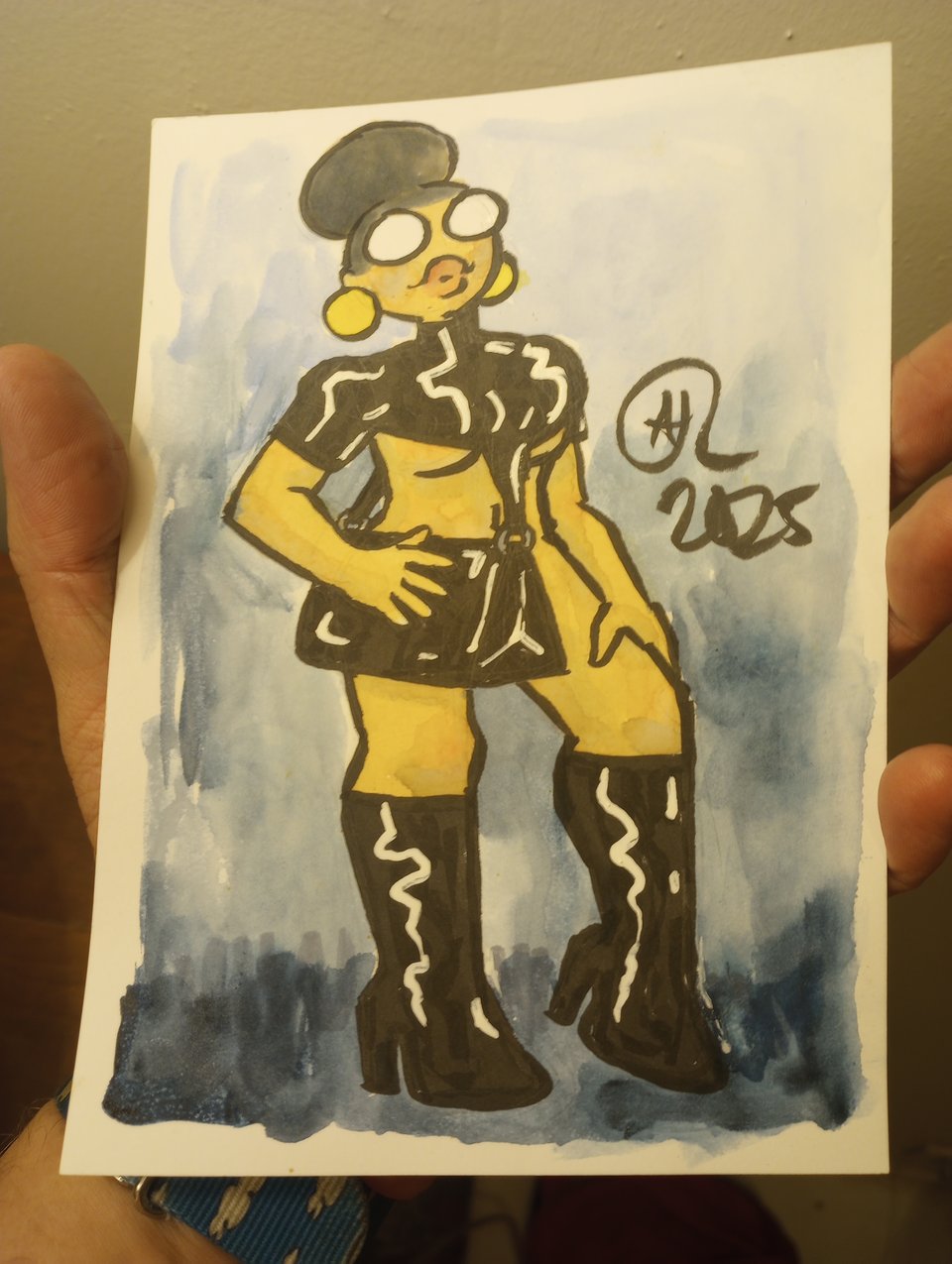 Val in a… purse top???? I don’t know