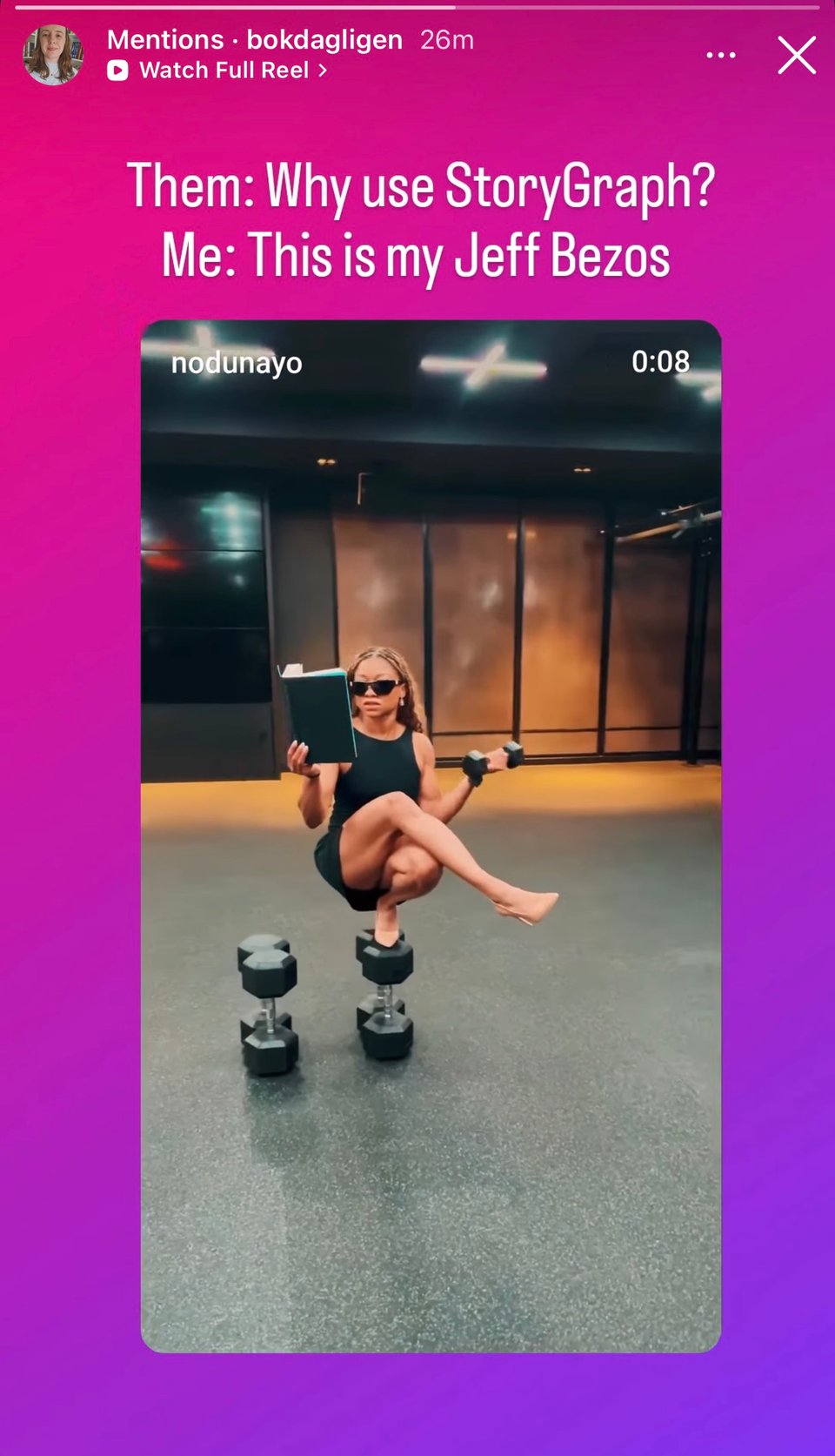 Instagram story screenshot with text “Them: Why use StoryGraph? Me: This is my Jeff Bezos” above a video of a woman balancing on dumbbells while reading a book and holding weights in a gym setting.