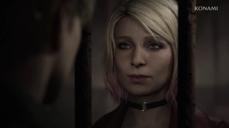 Maria looking at James through the bars of her cell