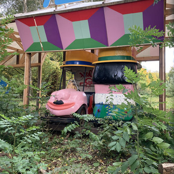 beautiful but broken rusting amusement park equipment in Treptower Park among the underbrush beautiful but broken rusting amusement park equipment in Treptower Park among the underbrush