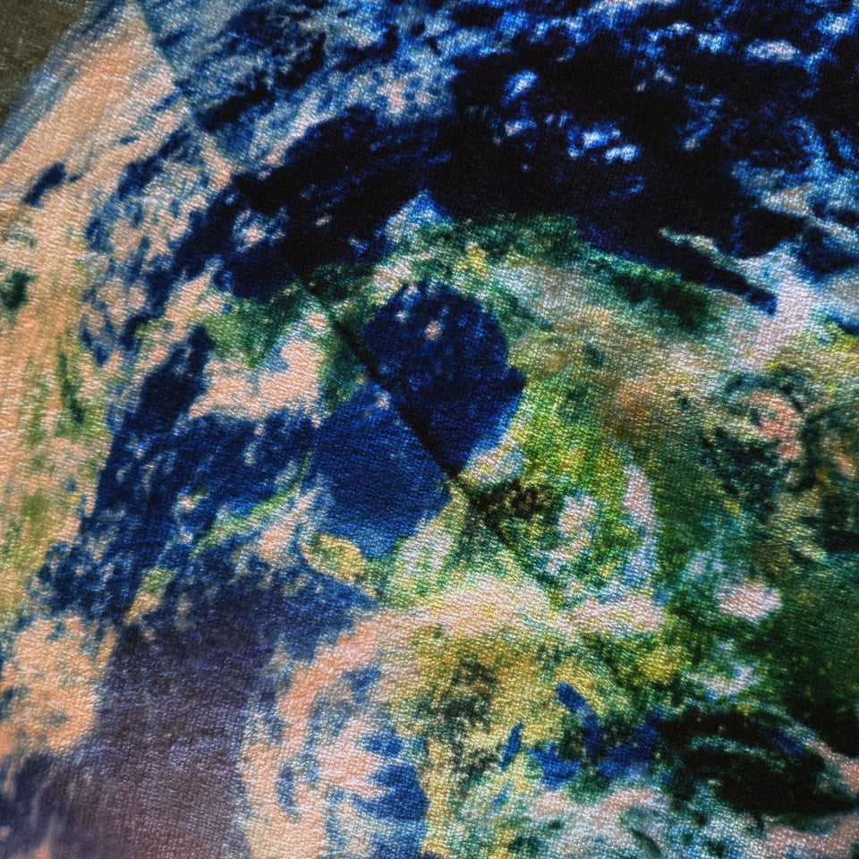 an image of the Earth printed on a towel