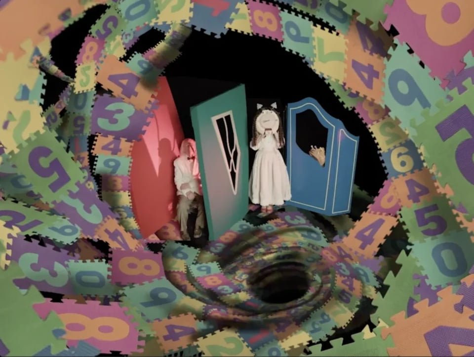 a group of people standing in front of a hole in the floor