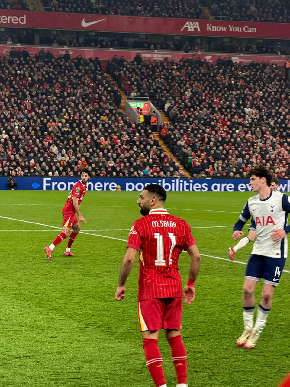 Image of Salah on the field at Anfield