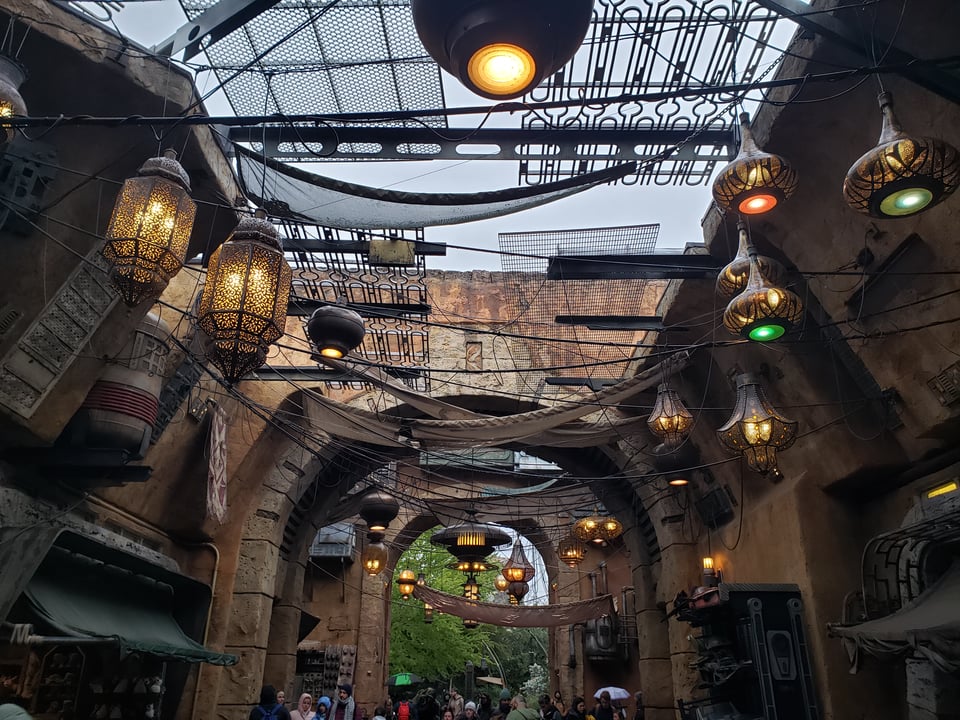 star wars-y looking lights over a star wars-y street, but this picture is from galaxy's edge at disney world