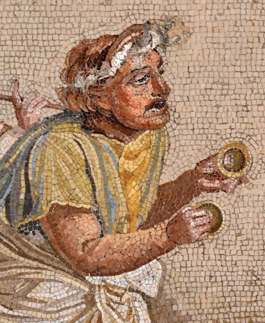 a close up of a mosaic from Pompeii of a man plaing finger cymbals