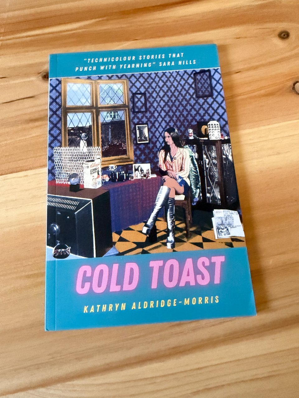 Picture of Cold Toast by Kathryn Aldridge-Morris, sitting on a light wooden background.