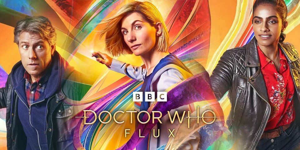 Dan, the 13th Doctor, and Yaz, against a banner reading DOCTOR WHO FLUX