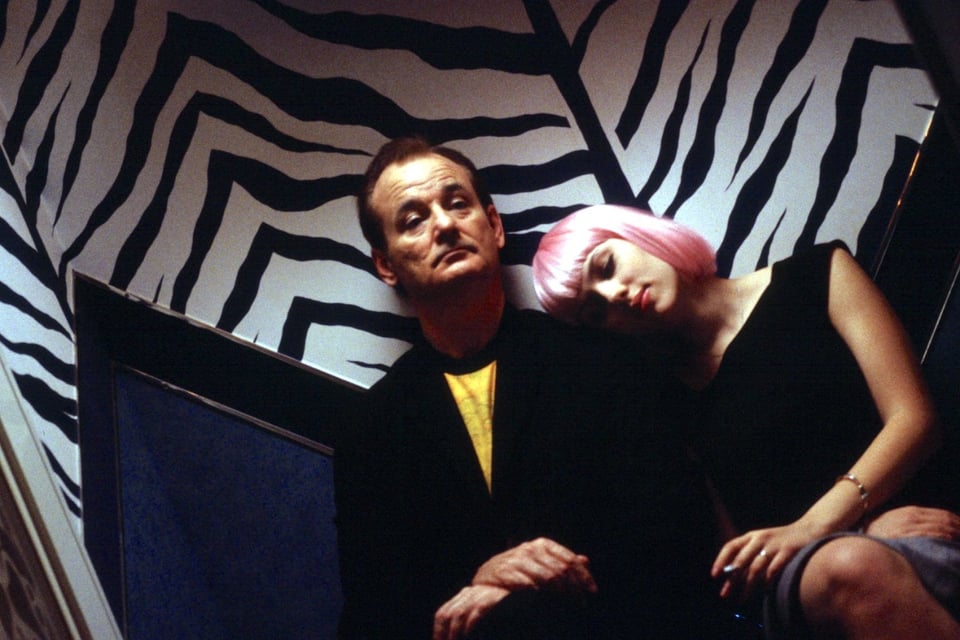 Charlotte (Scarlett Johansson) resting her head on Bob( Bill Murray)’s shoulder